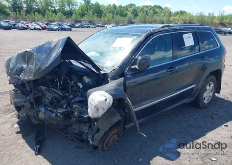 2011 Jeep Grand Cherokee Laredo from USA, damaged, VIN 1J4RR4GG4BC523282